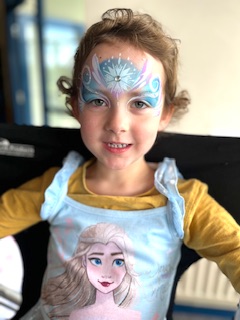 Elsa face paint on a young girl in Shrewsbury